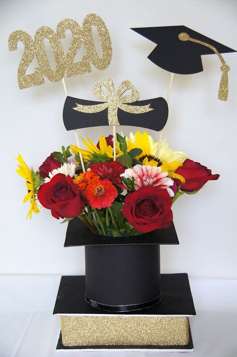 "Item details Handmade \"Set of 3 graduation sticks for Centerpiece\" You will receive ONE 2020 stick and Cap + Diploma MEASUREMENTS: '''2020 is approximately 3.0' x 5.5 attached to a 12 inche stick. '''Diploma approximately 2.5''x5.9'' attached to a 8'' stick. Cap approximately 3''x6'' attached to 12 stick. FINISH: Single-side sets number is white on the back, diploma back white, cap back white. Double -sided sets have same finish front and back. we have many glitter and regular colors availabl Table Graduation Decorations, Graduation Cap Centerpiece Ideas, Graduation Designs Ideas, Graduation Day Decoration, Grad Party Table Centerpieces, Graduation Flower Centerpieces, Graduation Centerpiece Ideas, Graduation Favors Diy, Centerpiece Graduation