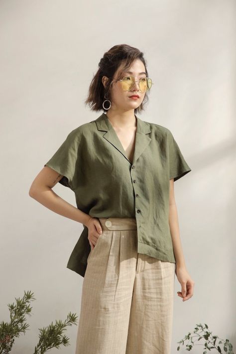 A staple that works overtime. The Ariana Linen Shirt features a notched collar, a clean button front, relaxed short sleeves and a boxy shape. Plus, it’s made of light, breathable linen, so it’ll keep you looking (and feeling) naturally cool all season long. Notched lapel collar V neckline Loose fitting Short sleeves Straight hem with side slits Floral Linen Top, Button Down Shirts For Women, Boxy Shirt Women, Lenin Outfits Women, Button Up Work Outfit, Linen Shirts Women Outfits Summer, Filipino Fashion Street Styles, Yellow Tshirt Outfit, Light Green Shirt Outfit