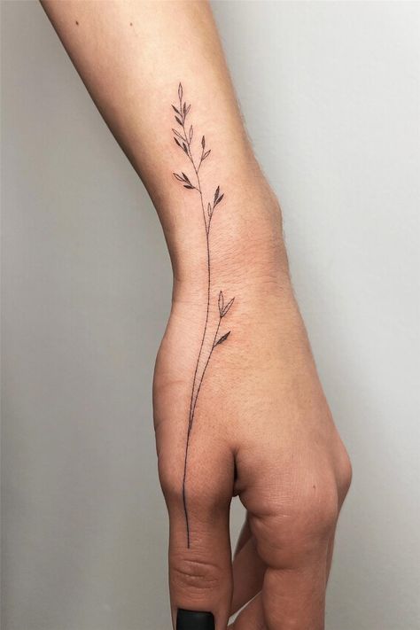 55 Meaningful Fine Line Tattoos for Minimalist Women Floral Thumb Tattoos, Spine Tattoos For Women Nature, Delicate Poppy Tattoo, Inside Wrist Tattoos For Women Cover Up, White Dandelion Tattoo, Fine Line Tattoo Nature, First Time Tattoo Ideas Woman, Forearm Wrap Around Tattoo, Plant Tattoos For Women