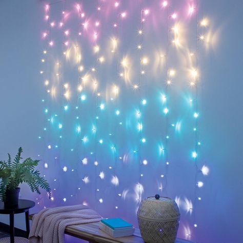 Light up your room with the West & Arrow Gradient Curtain Lights. 8 strands with a total of 200 LED lights in pastel colors with flashing modes effect. These LED lights run on batteries or USB powered, require no assembly, and are sure to add warmth and elegance to your space. Easily hang them with the included adhesive hanging hooks. Pastel, Cloud Bedroom, Modern Bedroom Wardrobe, Rainbow House, Unicorn Bedroom, Fantasy Bedroom, Cute Curtains, Bedroom Cupboard, Curtain String Lights