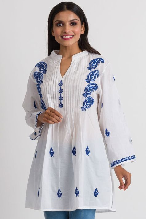 "Our Kamalika Tunic is hand embroidered by women artisans in Northern India in the shadow-work style known as \"Chikankari\". Chikankari is a delicate and artfully done hand embroidery technique that women in this region have been doing for generations.  Available in two sizes, S/M and L/XL, this beautiful 100% cotton tunic is designed for a comfortable and elegant fit." Hand Embroidered Tunics, Boys Kurta Design, Embroidered Caftan, Magenta Dress, Fair Trade Clothing, Embroidered Tunic Top, Cotton Tunic, Embroidered Tunic, Cotton Tunics