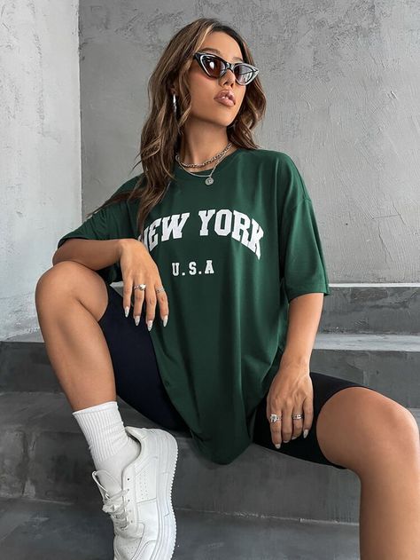 Letter Graphic Drop Shoulder Tee | SHEIN USA Down Shoulder Tshirt Women, Cool Streetwear Women, Womens Baggy Streetwear, Green Tee Shirt Outfit, Oversize Tee And Biker Shorts, Summer Shorts And Tee Outfit, Long Tshirt Outfits Summer, Tshirt Style Ideas, Green T Shirt Outfit Women