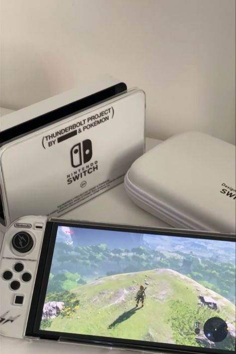 Nintendo Switch Oled White, White Nintendo Switch Aesthetic, Nintendo Oled Aesthetic, Nintendo Switch Aesthetic Games, Switch Oled Aesthetic, Nintendo Switch Wallpaper, Nintendo Switch Oled Aesthetic, Nintendo Switch Aesthetic Case, Nintendo Switch White