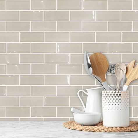 "Get these RoomMates Taupe Seaglass Peel & Stick StickTiles® at Michaels. com. Made to look and feel like the real thing, this budget-friendly solution will upgrade your countertop space in as little as peel, stick, done! Create the look of real subway tile with this peel and stick backsplash! Made to look and feel like the real thing, this budget-friendly solution will upgrade your countertop space in as little as peel, stick, done! An easy way to redecorate, RoomMates StickTiles adhere to any Peel And Stick Countertop, Kitchen Backsplash Peel And Stick, Wallpaper Backsplash, Traditional Backsplash, Backsplash With White Cabinets, Room Mates, Stick Tile Backsplash, Peel Stick Backsplash, Wallpaper Kitchen