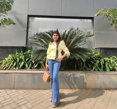 Pale Yellow is such a happy colour. This casual Summer outfit looks stylish and cute. I wore this peplum top with wide bottom jeans.  #peplumtop #summerootd #ootd #summers #widebottomjeans Wide Trousers, Peplum Top Outfits Casual, Wide Bottom Jeans, Peplum Top Outfits, Outfit Looks, Summer Ootd, Bottom Jeans, Ootd Summer, Casual Summer Outfit