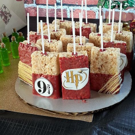 Had rice krispie bars personalized for my daughter Harry potter Birthday theme w the 9 3/4 and HP logo Harry Potter Rice Crispy Treats, Harry Potter Candy Table Ideas, Harry Potter Treat Table, Harry Potter Sweet Table, Harry Potter Rice Krispie Treats, Harry Potter Gender Reveal Decorations, Harry Potter Candy Table, Harry Potter Dessert Table, Harry Potter Birthday Theme