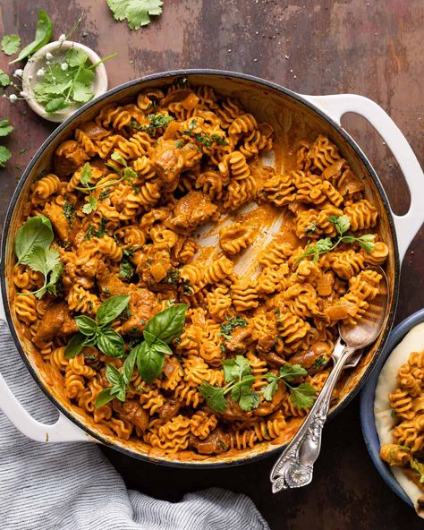 This Butter Chicken Pasta is my twist on an Indian classic. The pasta is tossed in a rich spiced tomato cream sauce and is loaded with tender chicken thighs. Everything you love about a classic butter chicken, but swap the rice for pasta. It all comes together in only about 30 minutes too! Essen, Butter Chicken Tacos, Butter Chicken Pasta Recipes, Chicken Enchiladas Easy Red Sauce, Red Sauce Chicken Enchiladas, Red Sauce Chicken, Easy Red Sauce, Butter Chicken Pasta, Tomato Chicken Pasta