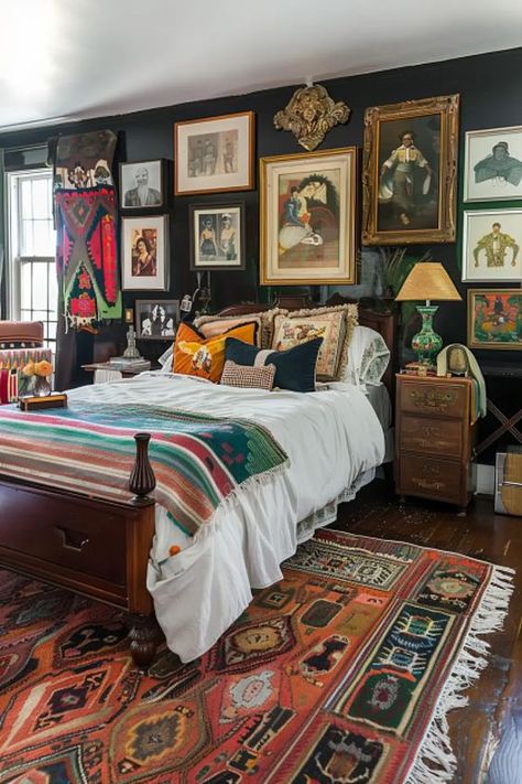 An eclectic art collection adds personality to your boho bedroom, channeling the creative spirit of the 1980s. Tap to see how to curate your own gallery wall! Feminine Eclectic Bedroom, Guest Bedroom Eclectic, Colourful Eclectic Bedroom, Eclectic Bedroom Inspirations, Vintage Eclectic Bedroom Ideas, Cozy Maximalism Bedroom, Red Boho Bedroom, Vintage Eclectic Bedroom, Eclectic Vintage Bedroom