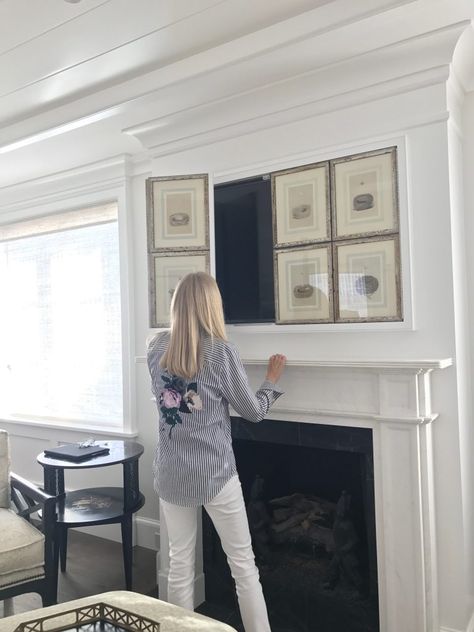 The perfect way to hide your TV! Tv Cabinet Above Fireplace Hidden Tv, Tv Shutters Hide Tv, Built In Tv Cabinet With Doors Hidden Tv, Hiding Tv Behind Artwork, Wall Cabinet For Tv, Hidden Tv Cabinet Over Fireplace, How To Conceal Tv In Living Room, Wall Mounted Tv Cabinet Hide Tv, Covered Tv Cabinet