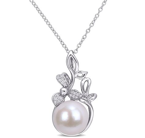 Take your look to the next level with a touch of sparkle, when you wear this pendant by AMOUR Pearls.  • Sterling silver • (1)11-12mm round shape Cultured Freshwater Pearl • (18) round shape, prong set & faceted Diamonds (0.065 av.ctw) • Average total gram weight: 4.80g • Pendant measures approximately 1 1/8" top to bottom • Pendant comes on a 18" chain with a spring ring clasp • Diamond Colour: GHI • Diamond Clarity: I2/I3 • Nickel free • Made in China Silver Necklace Designs, Floral Pendant Necklace, Pearl And Diamond Necklace, Pearl Details, Engagement Ring Shapes, Floral Pendant, Pearl Design, Pendant With Chain, Pearl Sterling Silver