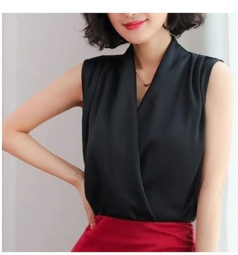 Elevate your summer wardrobe with this Korean-inspired V-neck satin sleeveless chiffon blouse! Perfect for any occasion, this breathable and comfortable blouse comes in red, black, and white colors. Available in sizes S-2XL, it's made of high-quality polyester material that's perfect for summer. #SummerFashion #KoreanStyle #SatinBlouse #ChiffonBlouse #WomenFashion 😍👌 https://ebay.us/vzeORn Silk Blouse Short Sleeve, Silk Top Outfit Classy, Classic Blouses For Women, Wrap Blouse Outfit, Silk Blouses For Women, Office Tops Blouses, Minimal Blouse, Silk Top Outfit, Silk Tops For Women