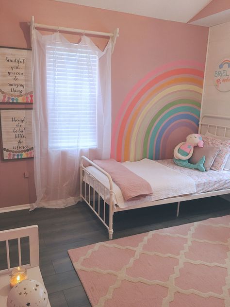 Infuse your space with creativity with creative rainbow bedroom decor ideas that are unique and original. Use a mix of colors and patterns for a playful and eclectic look. Add creative accents like rainbow-themed art and accessories for a whimsical touch. Create a bedroom that is creative and inspiring with these ideas. 🌈🎨 #creativedecor #uniqueandoriginal #playfuleclectic #whimsicaltouch #rainbowdecorideas Rainbow Bedroom Paint Ideas, Pink And Rainbow Bedroom, Kindergarten Girl Bedroom Ideas, Pink Room With Rainbow, Purple And Pink Toddler Room, Rainbow Theme Bedroom Kids Rooms, Purple Rainbow Bedroom, Pink Childrens Bedroom, Pink And Purple Kids Bedroom