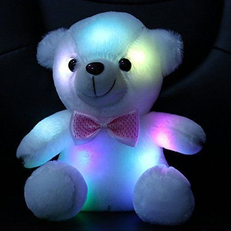 Isn’t this stuffed teddy bear just adorable? It’s white, made of cotton, eight inches tall, and super soft. When you press the “On” button, the LED lights inside glow and change colors.      It works wonderfully as a nightlight and can be very soothing to toddlers at bedtime. Cute Teddy Bear Pics, Girls Xmas Gifts, Purple Teddy Bear, Teddy Bear Images, Teddy Day, Teddy Bear Pictures, Teddy Toys, Teddy Bear Toys, Kids Night