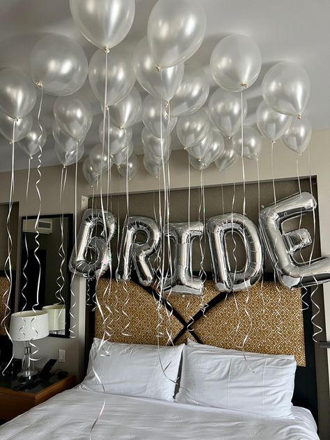 'Bride' balloons set up above a bride's bed in hotel room for bachelorette party Bride Bedroom Decoration Bachelorette, Blue Bachelorette Party, Chic Bachelorette Party, Sweetheart Table Centerpiece, Classy Bachelorette Party, Bachelorette Inspo, Bachelorette Party Decor, Bachelorette Planning, Yellow Wedding Theme