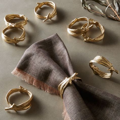 On sale.  Free Shipping.  Shop Sylvie Gold Napkin Rings Set of 8.  Tied ribbons that never break.  Eight handmade brass napkin rings are sand cast in two pieces each and welded together to form ring shapes with raffia-like texture and detail. Modern Napkin Rings, Navy Blue Napkins, Gold Napkin Rings, Gingham Napkins, Yellow Napkins, White Linen Napkins, Metal Napkin Rings, Beaded Mirror, Ring Photography