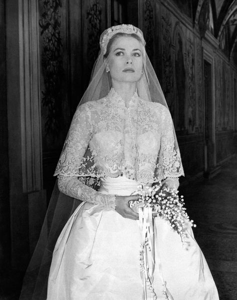 Grace Kelly's iconic wedding dress: http://www.stylemepretty.com/2015/07/09/100-of-the-most-iconic-wedding-dresses-ever/ Grace Kelly Wedding Dress, Grace Kelly Wedding, Helen Rose, Royal Wedding Gowns, Romona Keveza, Iconic Weddings, Princess Grace Kelly, Prince Rainier, Celebrity Wedding Dresses
