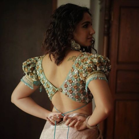 Latest and trendy designer blouses 2021 by Sruti Kannath! Choli Blouse Design, Saree Blouse Styles, Blouse Designs Catalogue, Latest Model Blouse Designs, New Saree Blouse Designs, Traditional Blouse Designs, Fashionable Saree Blouse Designs, Backless Blouse Designs, Blouse Back Neck Designs