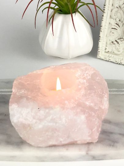 Introducing our beautiful Rose Quartz tea light candle holder - the perfect addition to your home decor! Made from high-quality raw rose quartz crystal, this candle holder will bring a touch of natural elegance to any room. The delicate pink hues of the rose quartz create a warm and inviting atmosphere, making it the perfect choice for relaxing evenings or special occasions. Rose Quartz Candle Holder, Rose Quartz Candle, Rock Candle Holder, Quartz Candle, Quartz Candle Holder, Rose Quartz Meaning, Stone Candle Holder, Rock Candle, Stone Candles