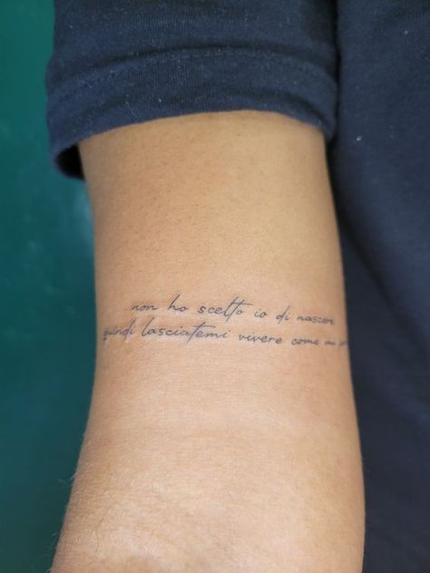 Arm tattoos. Quote tattoos. Italian tattoos. Quote On Back Of Arm Tattoo, Good Placement For Quote Tattoos, Quotes Tattoos Placement, Lyric Placement Tattoo, Words On Bicep Tattoo, Tattoo Quotes Placement Ideas, Small Writing Arm Tattoo, Quote Tattoos Font, Quote Tattoo Arm Placement