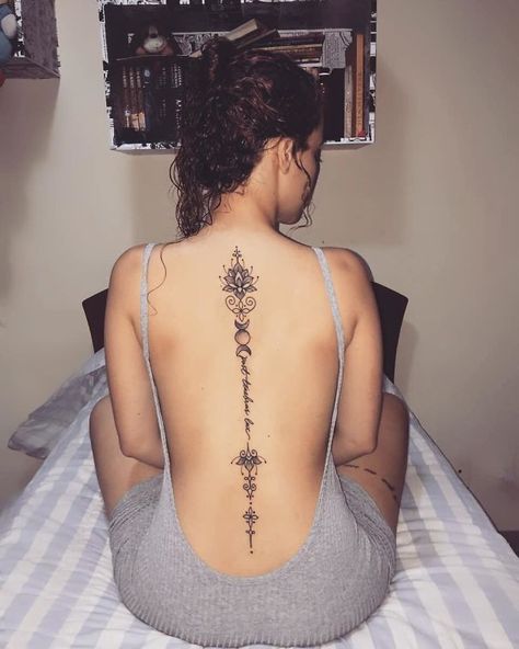 20+ Of The Best Spine Tattoo Ideas Ever #tattoo #tattoosideas #tattooart #coupletattoos Back Tattoo Down Spine, Native American Spine Tattoos For Women, Spine Tattoo Mandala, Moon Back Tattoo Spine, Down The Back Tattoos, Spine Mandala Tattoo, Henna Tattoo Designs Spine, Mandala Tattoo Back Spine, Mandala Tattoo Spine