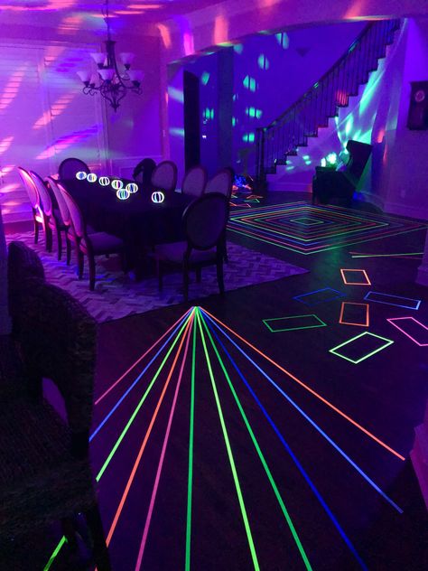 Glow Party Floor Design, Neon Party Photo Backdrop, Nye Glow Party, Neon Party Table Centerpieces, Glow Tape Ideas, Neon Lights Party Theme, Neon Tape Dance Floor, Glow In The Dark Tent Party, Neon Blacklight Party