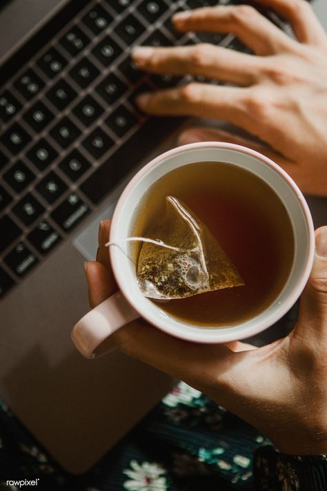 Woman holding a cup of tea while using a laptop | premium image by rawpixel.com / McKinsey Drinking Tea Photography, Holding A Cup Of Tea, Mate Tee, Photography Ideas At Home, Herbal Teas Recipes, Iced Tea Recipes, Coffee Photography, A Cup Of Tea, Jolie Photo