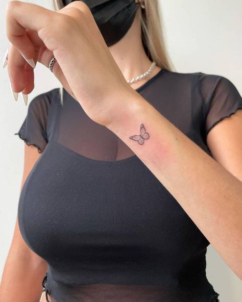 Fine line butterfly tattoo on the wrist. Fine Line Butterfly Tattoo, Line Butterfly Tattoo, Fine Line Butterfly, Line Butterfly, Tato Minimal, Butterfly Tattoos On Arm, Side Wrist Tattoos, Butterfly Wrist Tattoo, Tiny Tattoos For Women