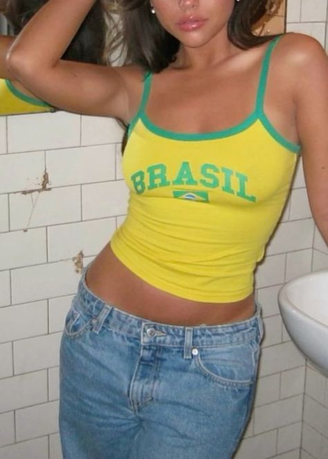 Brazil Tank Top Outfit, Blue Jean Vest Outfit Summer, 2000s Tank Top Outfit, Brazil Top Aesthetic, Brasil Top Outfit, Brasil Shirt Outfit, Yellow Graphic Tee Outfit, Blue Shirt Outfit Aesthetic, Brazil Top Outfit