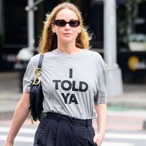 GQ on Instagram: "Merch may be over, but @loewe’s “I Told Ya” tee is still the shirt of the summer. Hit the link in bio for deets on Jennifer Lawrence’s latest fit featuring the hottest ‘Challengers’ grail in town." Instagram, Jennifer Lawrence, Clothes, The Shirt, Be Still, The Borrowers, Gq, Link In Bio