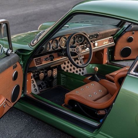 Singer Vehicle Design on Instagram: "Here’s the Redding commission.    Interior trimmed in Vivaldi with woven leather and nickel grommets.    Kauai Green Metallic exterior with ghosted stripes and Campfire Orange lettering.    #Singer #california #porsche" Porsche Singer Interior, Singer Porsche Interior, Porsche Interior, Porsche Singer, Singer Porsche, Singer Vehicle Design, Porsche 924, Orange Interior, Vehicle Design