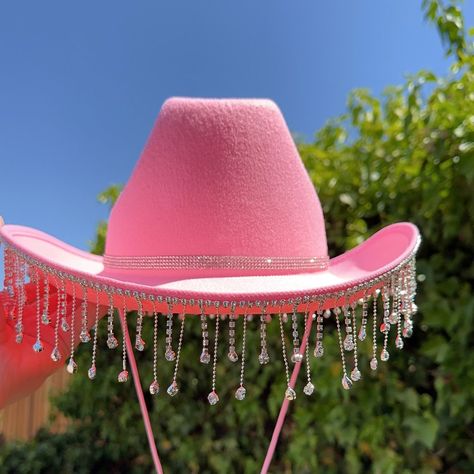 Pink Cowboy Hat, Diamond Rhinestone Fringe Cowgirl Hat,With Rhinestone Hat Band Comes With Removable Chin Strap. The Fringe On The Rhinestone Fringe Bride Cowboy Hat Is A Heavy, Good Quality, Crystal Clear Diamond Fringe Material. Hand Made Size: Adult One Size Fits All. Color: Available In Color Pink, White. Black. Hat Band: Double Rhinestone Band Securely Attached To The Middle Area Of The Hat. If You Prefer No Band, We Can Do That As Well. Great For Western Birthday Party, Bachelorette Party, Wedding,Last Hoedown,Bride, Cowgirl Hat, Cowboy, Nashville Bachelorette, Music Festival, Tik Tok, Bridal, Rodeo, Disco Rodeo, Space Cowboy, Raves,Concerts And More. Each Hat I Barbie Cowgirl Hat, Cowgirl Pink Hat, Bedazzled Cowgirl Hat, Pink Cowboy Party, Decorated Cowgirl Hats, Pink Space Cowgirl, Hot Pink Cowgirl Hat, Fringe Cowgirl Hat, Disco Cowgirl Aesthetic