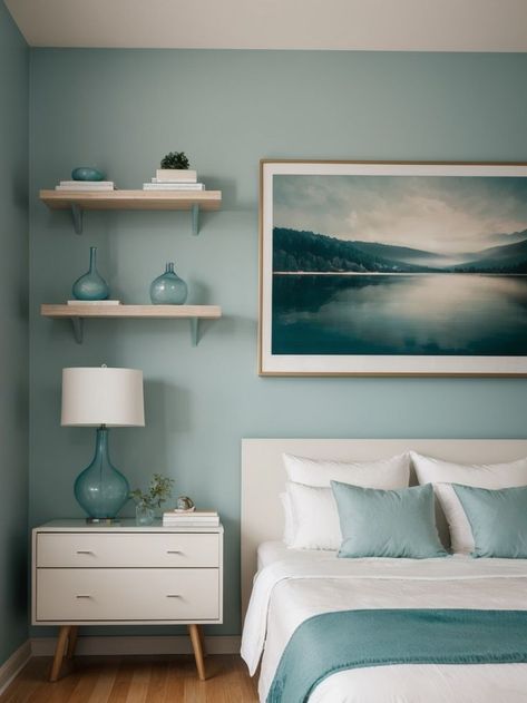 Soothing and Serene: Teal Bedroom Decor Ideas Showcase your artistic side by turning your bedroom into a gallery-like space with wall-mounted shelves to display your favorite artwork or sculptures. #TealIdeas #TealDesign Bedroom Design Turquoise, Aqua Grey Bedroom, Teal Cream Bedroom, Teal Bedroom Feature Wall, Teal Rustic Bedroom, Sea Blue Bedroom Ideas, Teal Bedroom Wall Ideas, Bedroom With Light Blue Accents, Teal And Aqua Bedroom