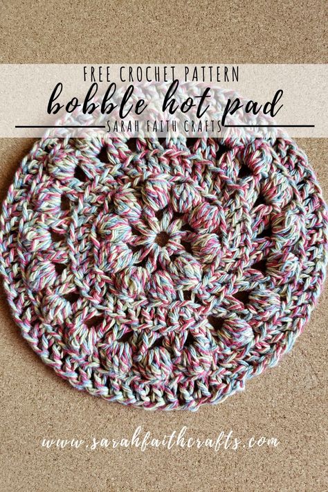 Free crochet pattern! Beautiful bobble stitch hot pad using Lily Sugar n Cream cotton yarn! Easy 1 hour project Amigurumi Patterns, Crochet Patterns For Cotton Yarn Free, Crochet Trivet Patterns Free, Round Crochet Hot Pad Free Pattern, Crochet Coaster Basket Free Pattern, Free Crochet Trivet Patterns, Crochet Hotpad Free Pattern, Cotton Yarn Projects Crochet, Crochet Hot Pad Free Pattern