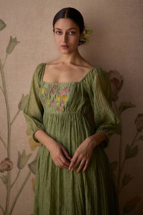 Green gathered flared chanderi tunic with floral block prints and hand embroidered yoke. - Aza Fashions