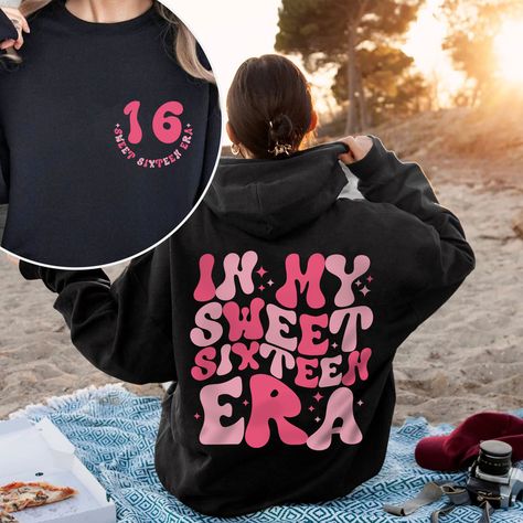 In My Sweet Sixteen Era Shirt, Sweet 16 Shirt, Custom Birthday Girl Shirt, Birthday Gift Ideas for Women, In My Birthday Era Sweatshirt 🎉 HOW TO ORDER: 1. Select the shirt 𝗦𝘁𝘆𝗹𝗲 2. Select the 𝗦𝗶𝘇𝗲 3. Select the shirt color 4. Select the quantity, 5. Click 𝗔𝗗𝗗 𝗧𝗢 𝗖𝗔𝗥𝗧. If you want to buy more than one, please go back to the listing and repeat the steps. - If you have any question, please send us a message. 🎉 Product details: - Relaxed fit, size up for oversized look. - Color may vary due to lighting or monitor settings. - Sizing has a tolerance of + or - 1 inch. 🎉 Highlighted features: - Versatile and fits all body shapes. - High-quality cotton fabric for comfort. - No excess threads on the product. 🎉 Care instructions: - Wash inside out in cold/warm water, delicate cy Sweet 16 Sweatshirt Ideas, Outfit Ideas For Sweet 16, Sweet 16 Gift Bags, Birthday Outfit For Teens Sweet 16, Sweet 16 Outfit Ideas Casual, Sweet 16 Gift Ideas, Sweet 16 Shirts, Birthday Gift Ideas For Women, Sweet 16 Outfits