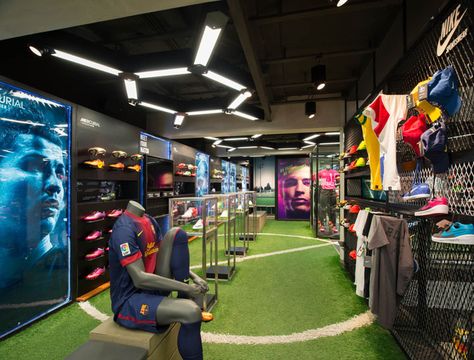 Ari Football flagship store Whitespace Bangkok 03 Football Store Display, Store Decoration Ideas, Sports Training Facility, Sport Bar Design, Batting Cage, Golden Table, Diy Living Room, Football Shop, Soccer Store