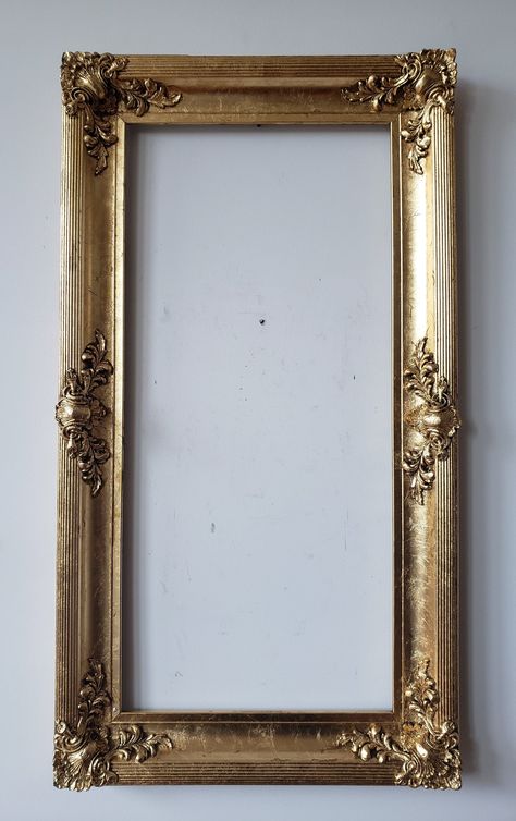 "PICTURE SIZE: 28 1/8\" x 13\"  OUTSIDE DIMENSION: 33\"  x 18 1/16\"  Antique frames from the late 1800s to the 1930s and 40s. Each frame is tightened and repaired in our shop. We then silver or gold leaf each frame with a more contemporary approach. Thus, leaving distressed areas equally proportioned to give each frame a neoclassical look. Finally, we patina each frame with our own recipe of materials creating a wonderful finish. This compliments the detail and age of the frames immaculately." Vintage Gold Frame Mirror, Long Picture Frame, Antique Mirror Frame, Royal Frame, Gold Photo Frames, Freeze Frame, Gold Art Painting, Old Picture Frames, Vintage Photo Frames