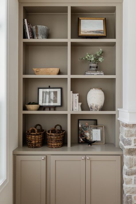 Cream Colored Bookcases, Brown Built In Shelves Living Room, Taupe Built Ins, Greige Built Ins, Taupe Bookshelves, Taupe Built Ins Bookshelves, Cream Bookshelf, Beige Built Ins, Brown Built Ins