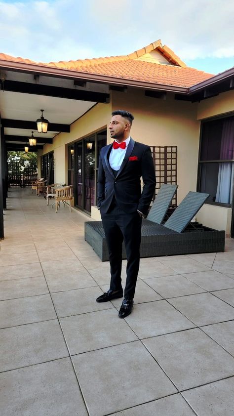 Black Tux Red Vest, Black Suit Red Accents Men, Black Suit With Red Bow Tie, Black And Red Prom Suit, Black Suit Red Shirt, Red Tux Prom, Black Suit With Red Tie, Black And Red Tux, Red And White Tuxedo