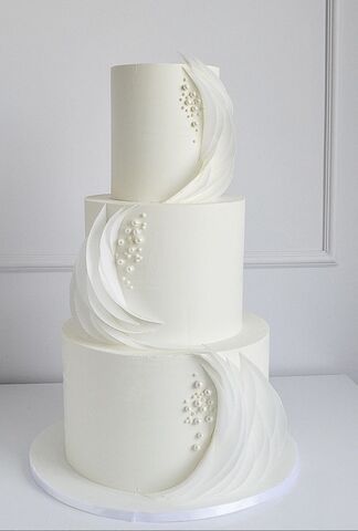 Sugarsneg | Wedding Cakes - The Knot White Cakes Wedding, Elegant Cake Wedding, Wedding Cakes Ideas Elegant, Cakes Wedding Elegant, White Minimalist Wedding Cake, Ivory Wedding Cake Elegant, Draped Wedding Cake, Modern Classic Wedding Cake, Wedding Cake Modern Elegant