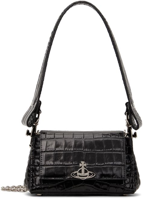 Find Vivienne Westwood Black Hazel Small Bag on Editorialist. Structured croc-embossed LWG-certified lambskin shoulder bag in black. · Detachable carry handle · Detachable chain link crossbody strap · Logo hardware at face · Bumper studs at base · Magnetic press-stud closure · Card slot at interior · Recycled cotton-blend twill lining · Logo-engraved silver-tone hardware · H3.5 x W6.75 x D2.75 Supplier color: Black Black Vivienne Westwood Bag, Bag Collection Closet, Magical Closet, Vivienne Westwood Bag, Vivienne Westwood Purse, Venus In Capricorn, Vivienne Westwood Bags, Shopping List Clothes, Dream Bag