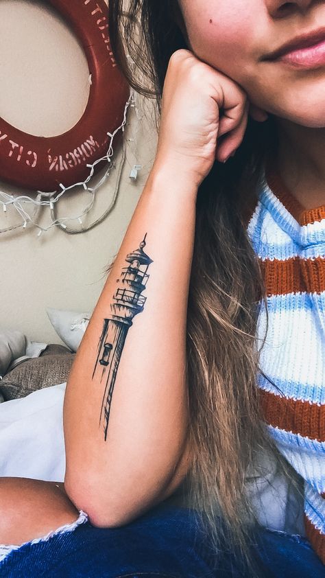 Lighthouse Tattoo Back Of Arm, Lighthouse Spine Tattoo, Maritime Tattoo Sleeve, Lighthouse Simple Tattoo, Unique Nautical Tattoo, Horse Compass Tattoo, Cargo Ship Tattoo, Womens Lighthouse Tattoo, Cute Lighthouse Tattoo