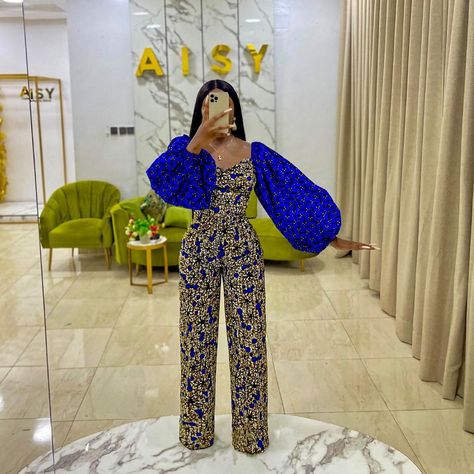 AISY - (The Unusual Girl)’s Instagram post: “✨NEW IN ✨ “Sarah set ��” 🤎💙 ————————————— Price: #18,000naira Sizes: 6-14 Sizes 16-18: #20,000naira Pls send a WhatsApp message to order 🙏🏼” Jumpsuit African Print, Ankara Jumpsuits, Ankara Prom Dress, Nigerian Dress Styles, Ankara Trousers, Ankara Dress Designs, African Print Jumpsuit, Ankara Jumpsuit, Prom Birthday