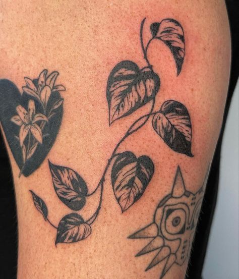 artist is linked! Poppy Arm Band Tattoo, Hip Patchwork Tattoo, Women’s Tattoo Patch Sleeve, Tikun Olam Tattoo, Leg Tattoo American Traditional, Tiny Pothos Tattoo, Traditional Iris Flower Tattoo, Tiny Black Tattoos, Back Tattoos American Traditional