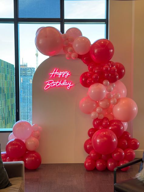 Step into a Dreamy Pink Wonderland! 🎈✨ Celebrate a magical birthday with our enchanting setup featuring a stunning white panel backdrop adorned with an array of mesmerizing pink balloons in various shades. The atmosphere is brought to life with a captivating pink neon signage that adds a touch of glam and excitement to the festivities. Get ready for an unforgettable celebration surrounded by the sweetest hues of pink, creating the perfect backdrop for cherished memories and joyful moments. Come Pink Birthday Party Balloon Arch, 11 Shades Of Pink Party, Birthday Panel Backdrop, Airbnb Party Decorations, Pink Backdrop Party, Back Drop Ideas For Birthday Party, Pink Friday Party, 30 Shades Of Pink Birthday Party, Pink Birthday Party Setup