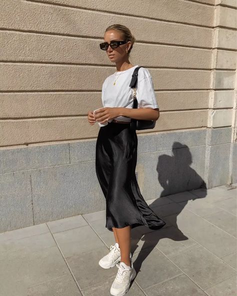 Black Silk Skirt Casual Outfit, Satin Skirt White Sneakers, Silk Skirt With Sneakers Outfit, Silk T Shirt Outfit, Silk Skirt With Jumper, Silk Skirt Outfit Sneakers, Silk Skirt Outfit Summer Casual, White T Shirt With Skirt, Black Slip Dress White Shirt