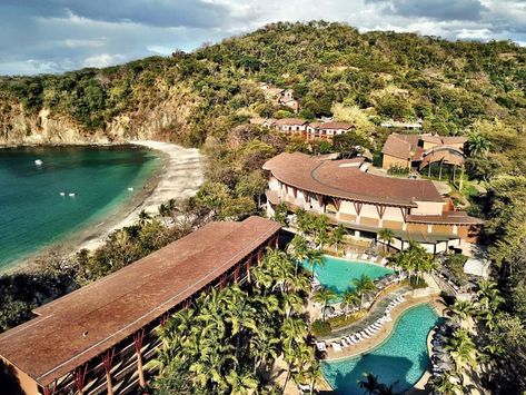 Aerial view of Four Seasons Hotel Costa Rica at Peninsula Papagayo building, resort by sand beach, under mountain Costa Rica, Papagayo Costa Rica, Costa Rica Luxury, Costa Rica Travel Guide, Costa Rica Resorts, Costa Rica Wedding, Four Seasons Resort, Costa Rica Travel, Central American