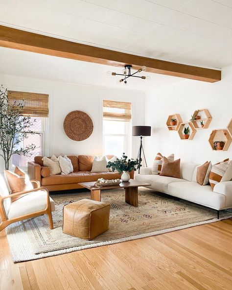Boho With Leather Couch, White Living Room With Leather Couch, Rustic Wood Living Room Decor, White Leather Couches Living Room, All White Boho Living Room, White Wall Wood Floor Living Room, Boho High Ceiling Living Room, White Earthy Living Room, Nice Couches Sofas Living Rooms