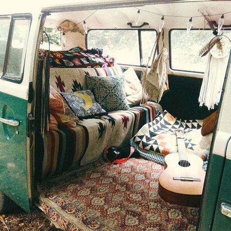 Furnished VW bus volkeswagen bus with geometric Aztec blankets acoustic guitar and bohemian Bohemia fashion style interior feuding Hippie Van Interior, Combi Hippie, Volkswagen Bus Interior, Kombi Hippie, Vans Vintage, Kombi Motorhome, Camper Travel, Bus Interior, Kombi Home