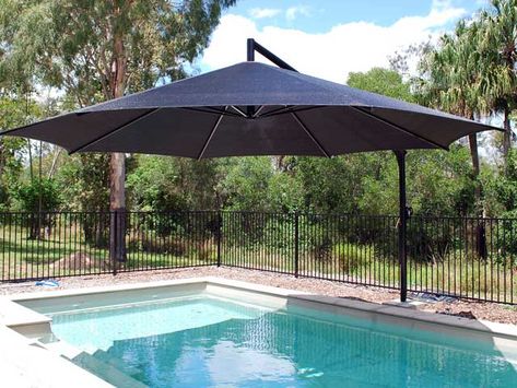 Black On Black Pool Umbrella | Planet Shade Bundaberg Pool Umbrella, Pool Paving, Deck Piscina, Pool Shade, Black Pool, Shade Tent, Pool Umbrellas, Swimming Pool Landscaping, Pool Landscape Design